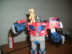 Size: 640x480 | Tagged: safe, applejack, g4, blind bag, irl, optimus prime, photo, toy, transformers, transformers cybertron, transformers galaxy force