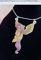 Size: 456x669 | Tagged: safe, artist:busoni, fluttershy, pony, g4, auction, irl, jewelry, merchandise, necklace, photo