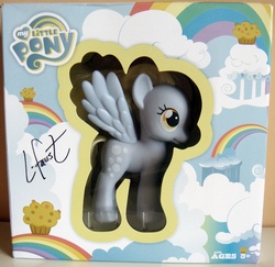 Size: 1000x971 | Tagged: safe, derpy hooves, pegasus, pony, g4, autograph, fashion style, female, irl, lauren faust, mare, photo, signature, solo, toy