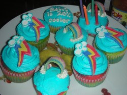 Size: 1000x750 | Tagged: safe, rainbow dash, g4, 20% cooler, candle, cupcake, food, frosting, irl, photo, rainbow cupcake, table