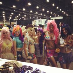 Size: 1024x1024 | Tagged: safe, artist:flirty fillies, artist:tarastrong, artist:xaleux, applejack, fluttershy, pinkie pie, rainbow dash, rarity, twilight sparkle, human, g4, belly button, belly piercing, bellyring, clothes, cosplay, irl, irl human, midriff, photo, piercing, short shirt, stanleecomikaze, text, twitter