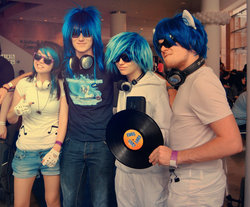 Size: 900x744 | Tagged: safe, artist:caffeinekid11, artist:lauren-campbell, dj pon-3, vinyl scratch, human, b.u.c.k., g4, b.u.c.k. 2012, convention, cosplay, group photo, headphones, irl, irl human, multeity, photo, record, rule 63, wub