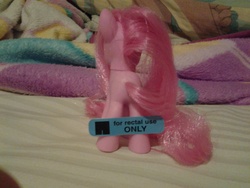 Size: 2048x1536 | Tagged: safe, pinkie pie, g4, brushable, butt, implied anal insertion, implied insertion, irl, photo, plot, sticker, toy