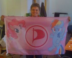 Size: 744x600 | Tagged: safe, pinkie pie, rainbow dash, human, g4, flag, irl, irl human, photo, pirate party