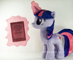 Size: 1024x846 | Tagged: safe, artist:eebharas, twilight sparkle, pony, g4, book, glowing, glowing horn, horn, irl, magic aura, photo, plushie, solo