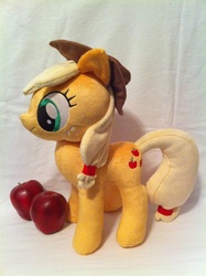 Size: 1936x2592 | Tagged: safe, artist:planetplush, applejack, earth pony, pony, g4, apple, irl, obligatory apple, photo, plushie, solo