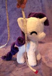 Size: 1062x1547 | Tagged: safe, artist:follylolly, rarity, pony, g4, hand, happy, irl, photo, plushie, solo
