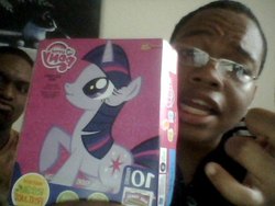 Size: 500x375 | Tagged: safe, twilight sparkle, cat, human, g4, glasses, irl, merchandise, photo, twilight is a lion