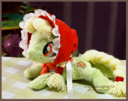 Size: 1113x881 | Tagged: safe, artist:piquipauparro, granny smith, earth pony, pony, g4, fluffy, irl, lying down, photo, plushie, prone, younger