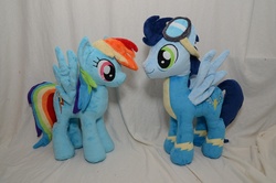 Size: 1000x662 | Tagged: safe, artist:makeshiftwings30, rainbow dash, soarin', pegasus, pony, g4, duo, irl, looking at each other, looking at someone, photo, plushie, spread wings, wings, wonderbolts uniform