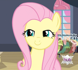 Size: 634x567 | Tagged: safe, fluttershy, pegasus, pony, g4, clothes hanger, female, flutterhigh, full face view, hub logo, indoors, lidded eyes, logo, mare, smiling, solo, the hub