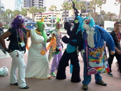 Size: 1024x768 | Tagged: safe, artist:checkerboardprincess, dj pon-3, queen chrysalis, rarity, spike, vinyl scratch, human, g4, comic con, cosplay, irl, irl human, photo, ponysuit, san diego comic con