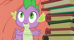 Size: 1599x871 | Tagged: safe, screencap, spike, dragon, g4, spike at your service, book, male, youtube caption, youtube link