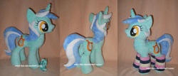 Size: 2088x894 | Tagged: safe, artist:calusariac, lyra heartstrings, pony, g4, clothes, irl, photo, plushie, socks, solo, striped socks, toy