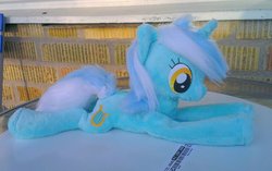 Size: 1129x708 | Tagged: safe, artist:epicrainbowcrafts, lyra heartstrings, pony, unicorn, g4, horn, irl, lying down, outdoors, photo, plushie, prone