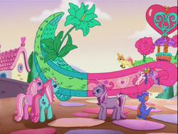 Size: 640x480 | Tagged: safe, screencap, master kenbroath gilspotten heathspike, minty, pinkie pie (g3), tiddly wink, tra-la-la, wysteria, zipzee, breezie, dragon, earth pony, pony, g3, the princess promenade, female, float, green, male, pink, wand