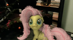 Size: 850x471 | Tagged: safe, fluttershy, pegasus, pony, g4, 3d, :3, christmas, christmas tree, female, holiday, irl, mare, photo, ponies in real life, tree, youtube link