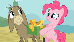 Size: 500x281 | Tagged: safe, screencap, cranky doodle donkey, pinkie pie, donkey, earth pony, pony, a friend in deed, g4, astartes pattern baldness, bipedal, duo, hoof hold, present, scrunchy face