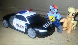 Size: 960x561 | Tagged: safe, applejack, rainbow dash, g4, blind bag, car, irl, lego, police car, toy