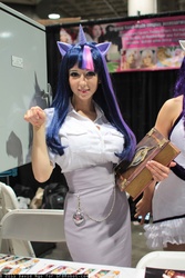 Size: 800x1200 | Tagged: safe, artist:ridd1e, artist:yayacosplay, twilight sparkle, human, g4, book, clothes, comikaze expo, convention, cosplay, irl, irl human, photo, skirt, solo, stall, tube skirt