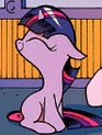 Size: 93x123 | Tagged: safe, idw, official comic, twilight sparkle, pony, g4, spoiler:comic, cute, eyes closed, filly, floppy ears, happy, hnnng, sitting, smiling, twiabetes