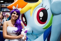 Size: 2048x1371 | Tagged: artist needed, safe, rainbow dash, rarity, human, g4, cosplay, irl, irl human, photo, plushie, san diego comic con