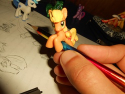 Size: 1141x856 | Tagged: safe, artist:synch-anon, applejack, human, g4, drawing, hand, irl, irl human, pencil, photo, toy, traditional art