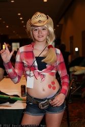 Size: 1365x2048 | Tagged: artist needed, safe, applejack, human, g4, a-kon, belly button, cosplay, cutie mark on human, front knot midriff, irl, irl human, midriff, photo, solo