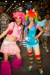 Size: 3162x4743 | Tagged: safe, pinkie pie, rainbow dash, human, g4, 2012, belly button, clothes, cosplay, irl, irl human, leg warmers, midriff, photo, san diego comic con, skirt