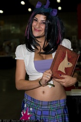Size: 1365x2048 | Tagged: safe, artist:flirt fillies, twilight sparkle, human, g4, belly, belly button, book, cleavage, comikaze expo, cosplay, female, irl, irl human, photo, solo