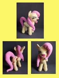 Size: 657x876 | Tagged: safe, artist:mantaro85, fluttershy, pegasus, pony, g4, eyes closed, female, flutteryay, irl, mare, photo, plushie, yay