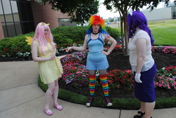 Size: 2896x1944 | Tagged: artist needed, safe, fluttershy, rainbow dash, rarity, human, g4, ama-con, clothes, cosplay, gloves, hand on hip, high res, irl, irl human, multicolored hair, photo, rainbow hair, rainbow socks, socks, striped socks