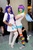 Size: 798x1200 | Tagged: artist needed, safe, artist:muggles, rainbow dash, rarity, human, g4, anime expo, clothes, cosplay, feet, irl, irl human, missing shoes, multicolored hair, photo, rainbow hair, rainbow socks, socks, stockings, striped socks