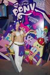 Size: 3264x4928 | Tagged: safe, artist:blakstarr, rarity, human, g4, belly button, belly piercing, bellyring, cosplay, irl, irl human, photo, piercing, san diego comic con, solo, sword, weapon