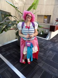 Size: 1030x1374 | Tagged: artist needed, safe, pinkie pie, human, g4, convention, cosplay, glasses, irl, irl human, photo, solo, youmacon, youmacon 2012