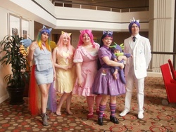 Size: 1024x768 | Tagged: safe, artist:naiadkitty, fluttershy, pinkie pie, rainbow dash, rarity, spike, twilight sparkle, human, g4, baby, clothes, convention, cosplay, dragon con, dragon con 2011, elusive, irl, irl human, photo, rule 63, suit