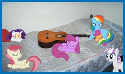Size: 614x367 | Tagged: safe, artist:drpain, berry punch, berryshine, rainbow dash, rarity, roseluck, scootaloo, twilight velvet, g4, bed, bedroom, dazzle sparkle, guitar, irl, photo, ponies in real life, sleeping