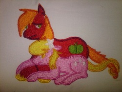 Size: 1024x768 | Tagged: safe, artist:ethepony, big macintosh, lily, lily valley, earth pony, pony, g4, cuddling, embroidery, lilymac, male, patch, prone, shipping, smiling, snuggling, stallion, straight