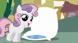 Size: 1024x571 | Tagged: safe, artist:mixermike622, sweetie belle, pony, unicorn, g4, context at source, female, filly, foal, horn, open mouth, open smile, pillow, role reversal, smiling, solo, still frame, youtube screencap