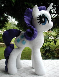 Size: 1060x1377 | Tagged: safe, artist:slipsntime, rarity, pony, unicorn, g4, horn, irl, outdoors, photo, plushie, solo