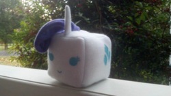 Size: 816x460 | Tagged: safe, artist:oceanblue97, rarity, g4, cube, irl, marshmallow, marshmallow pony, outdoors, photo, plushie, rarity is a marshmallow, solo