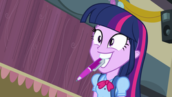 Size: 1920x1080 | Tagged: safe, screencap, twilight sparkle, alicorn, equestria girls, g4, my little pony equestria girls, adorkable, awkward smile, backpack, balloon, bowtie, cute, dork, female, humans doing horse things, mouth drawing, mouth hold, pen, smiling, solo, stage, streamers, twiabetes, twilight sparkle (alicorn)