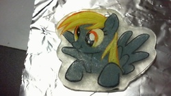 Size: 640x360 | Tagged: safe, artist:melinda chovexani, derpy hooves, pegasus, pony, g4, female, keychain, mare, scrunchy face, shrinky dink