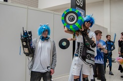 Size: 2048x1361 | Tagged: safe, artist:gavinclinton, artist:phillarkm, dj pon-3, vinyl scratch, human, g4, bass cannon, convention, cosplay, irl, irl human, london mcm expo, photo, weapon