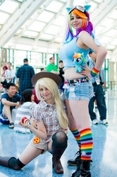 Size: 712x1072 | Tagged: safe, artist:agentt3xas, artist:geekeryandsuch, applejack, rainbow dash, human, g4, anime expo, belly button, cosplay, irl, irl human, midriff, photo