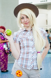 Size: 712x1072 | Tagged: safe, artist:agentt3xas, applejack, human, g4, anime expo, apple, convention, cosplay, irl, irl human, obligatory apple, photo