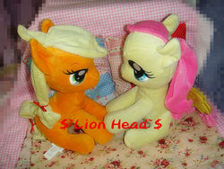 Size: 640x480 | Tagged: safe, applejack, fluttershy, g4, aurora, bedroom eyes, female, irl, lesbian, photo, plushie, ship:appleshy, shipping, taobao