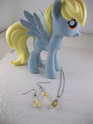 Size: 2748x3664 | Tagged: source needed, safe, derpy hooves, pegasus, pony, g4, earring, female, funko, irl, jewelry, mare, photo, toy