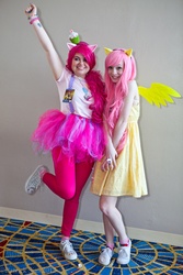 Size: 1333x2000 | Tagged: safe, artist:irisraydiant, artist:patcave, fluttershy, pinkie pie, human, g4, clothes, cosplay, irl, irl human, momocon, momocon 2012, photo, suspenders, tutu