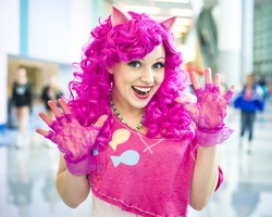 Size: 950x760 | Tagged: safe, artist:aktrez, pinkie pie, human, g4, clothes, cosplay, fingerless gloves, gloves, irl, irl human, photo, solo, wondercon, wondercon 2012